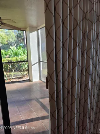 a view of a window in an empty room