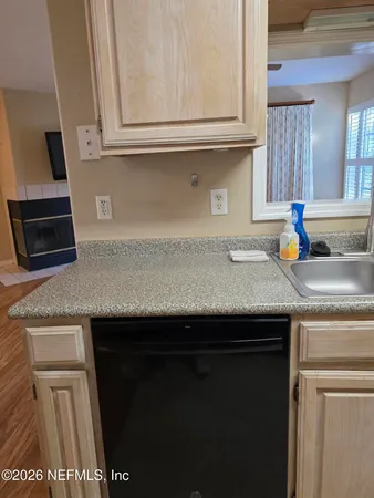 a refrigerator freezer sitting in a kitchen