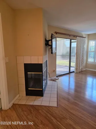a kitchen with stainless steel appliances a refrigerator and a stove top oven