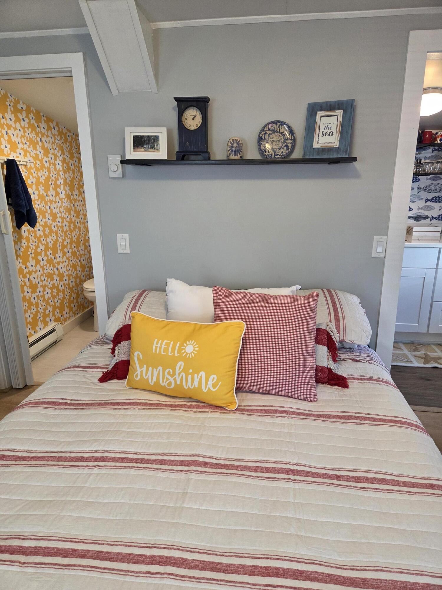 1061 State Highway, Unit 4 Eastham, MA 02642 - Photo 5 of 27 a bedroom with a bed and a window