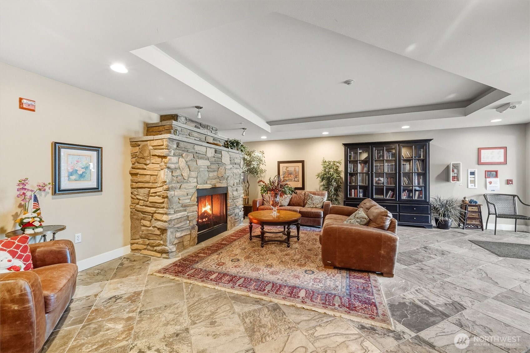 255 West Bakerview Road, Unit B103 Bellingham, WA 98226 - Photo 29 of 40 a living room with fireplace furniture and a fireplace