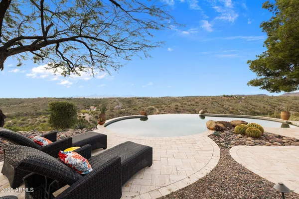 a view of a terrace with sitting area