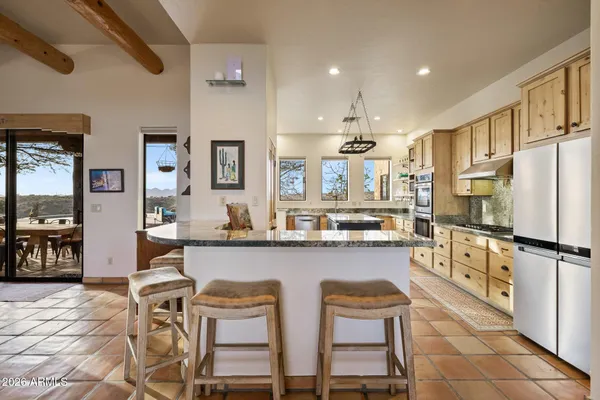 a view of building with an outdoor space and seating area