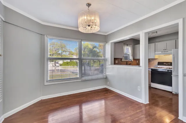 a kitchen with appliances cabinets and a sink