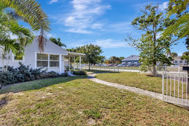 a view of a house with swimming pool