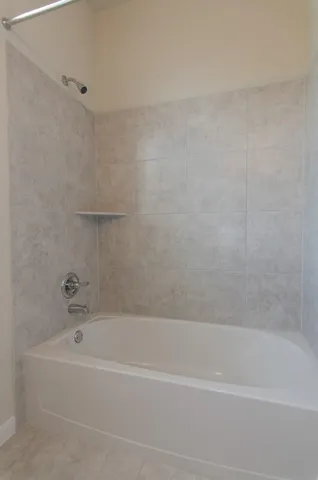 a bathroom with a bathtub