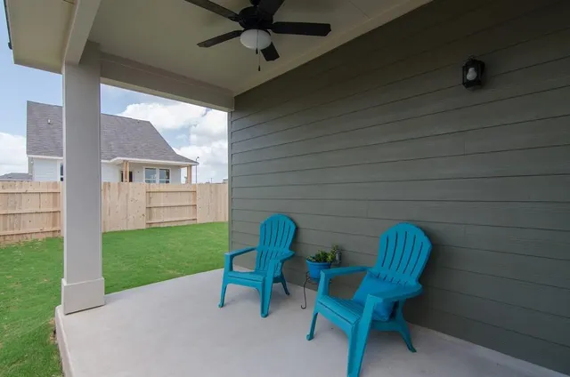 a view of a chairs in patio of the house