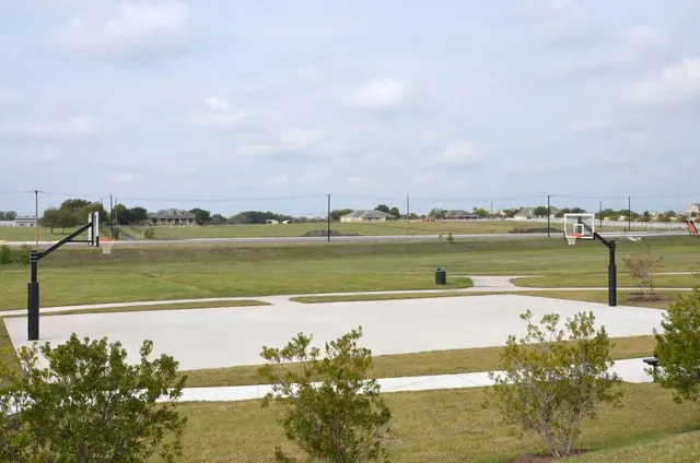 a view of a lake with a city