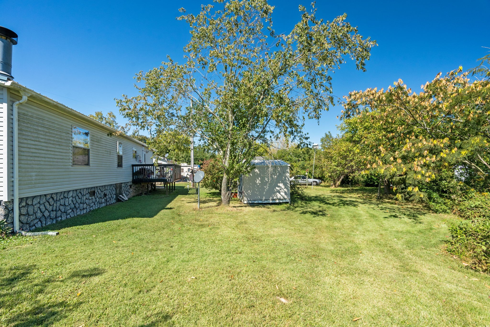 260 Ragland Road Cottontown, TN 37048 - Photo 13 of 36 a view of back yard of the house