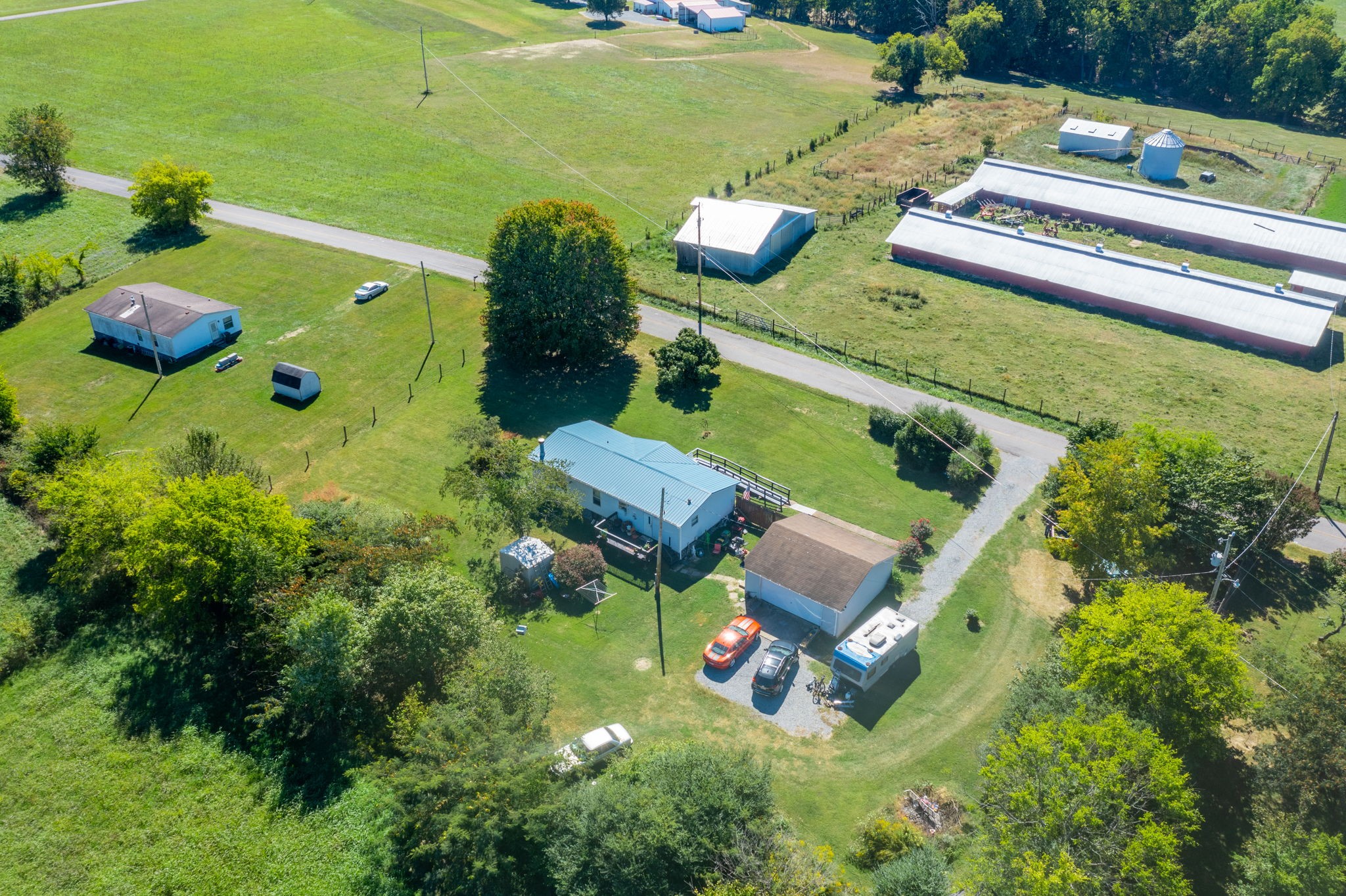 260 Ragland Road Cottontown, TN 37048 - Photo 18 of 36 an aerial view of a house with outdoor space