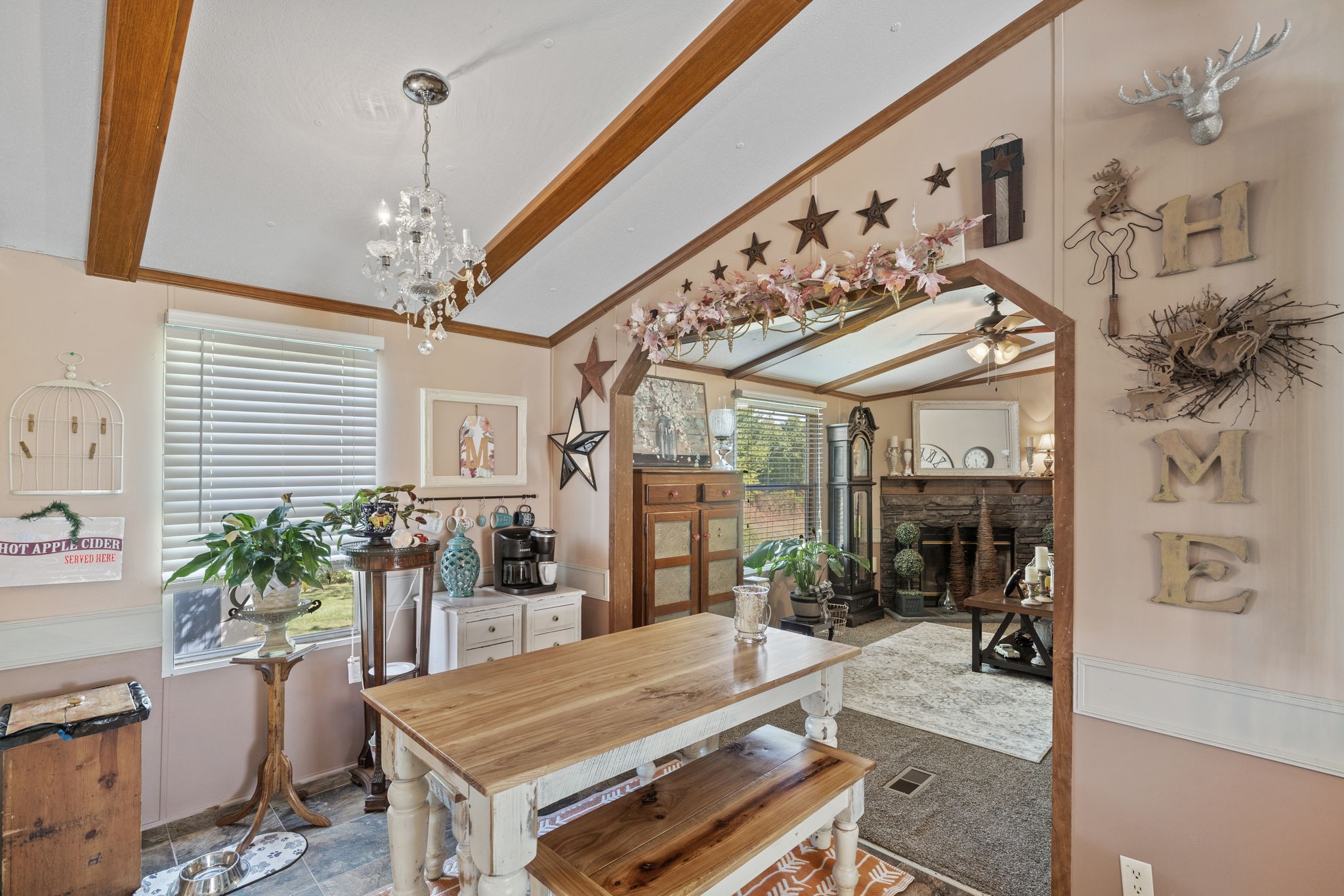 260 Ragland Road Cottontown, TN 37048 - Photo 24 of 36 a room with lots of furniture and potted plants
