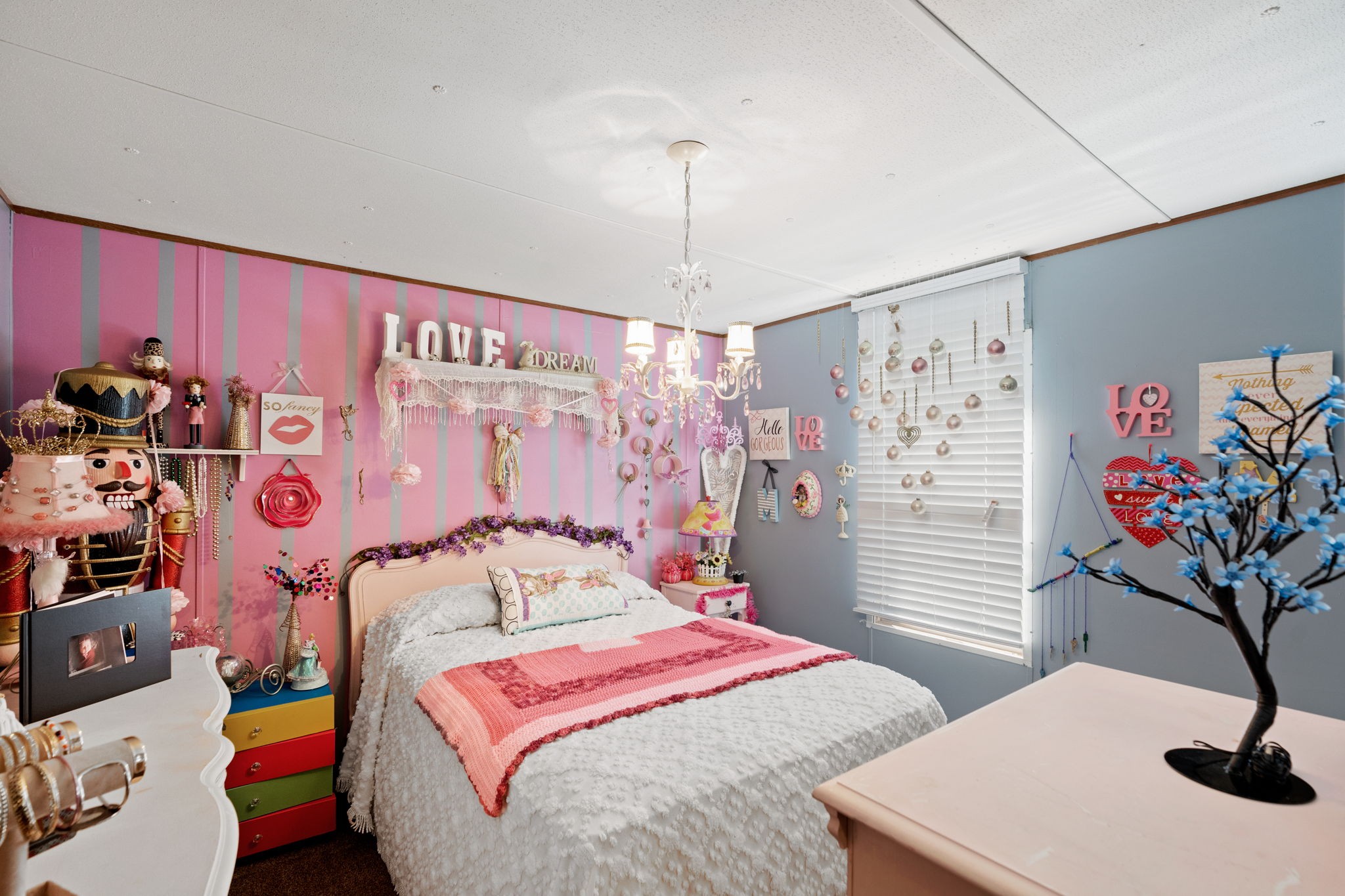260 Ragland Road Cottontown, TN 37048 - Photo 33 of 36 a bedroom with a bed and a table in it