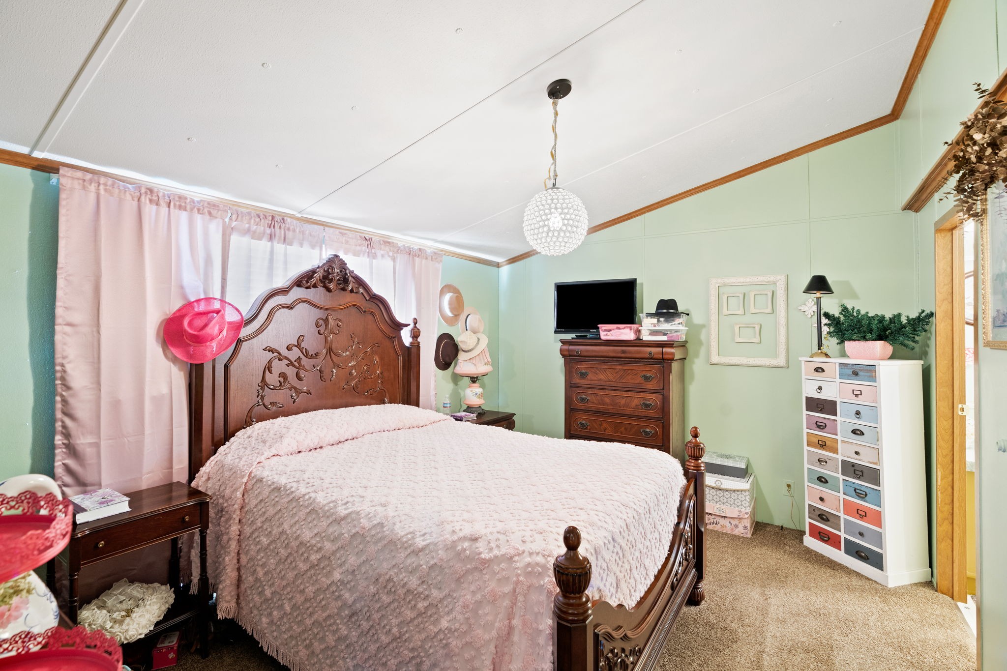 260 Ragland Road Cottontown, TN 37048 - Photo 34 of 36 a bedroom with a bed and a flat tv screen