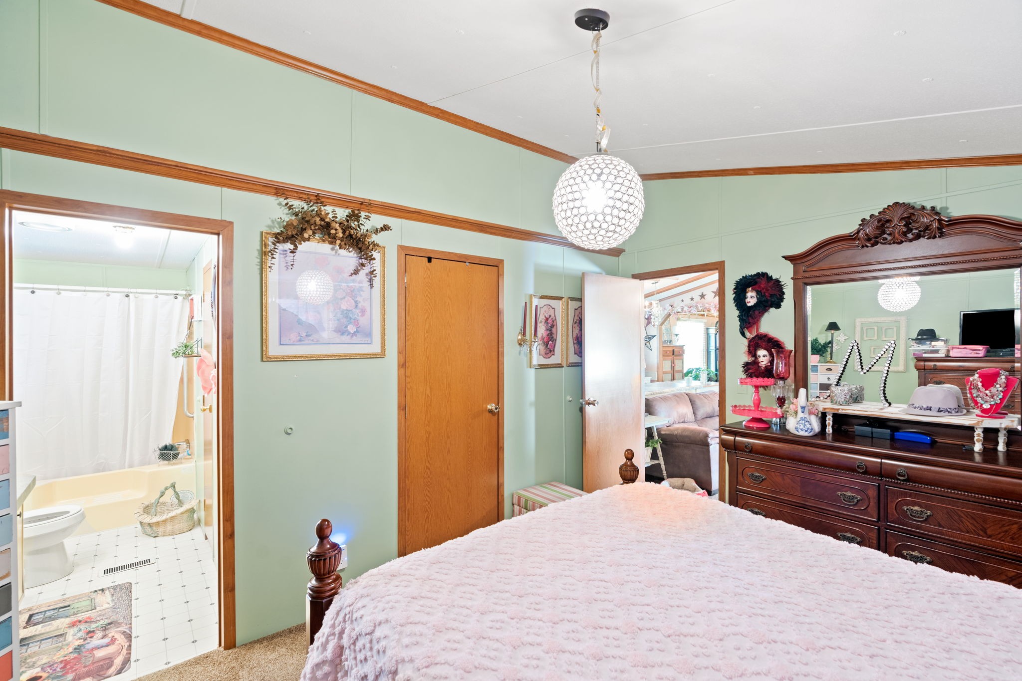 260 Ragland Road Cottontown, TN 37048 - Photo 35 of 36 a bedroom with a bed and wooden floor
