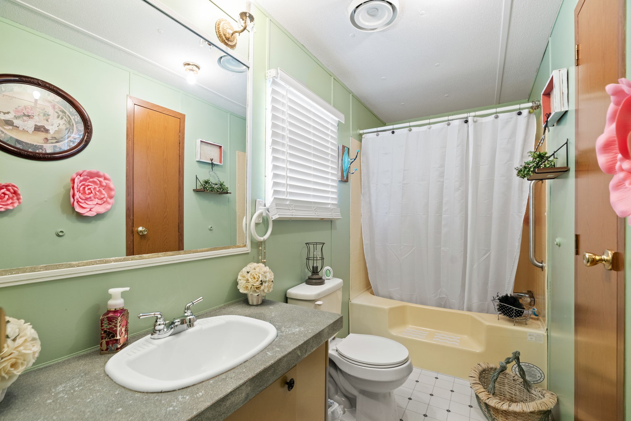260 Ragland Road Cottontown, TN 37048 - Photo 36 of 36 a bathroom with a sink a toilet and shower curtain