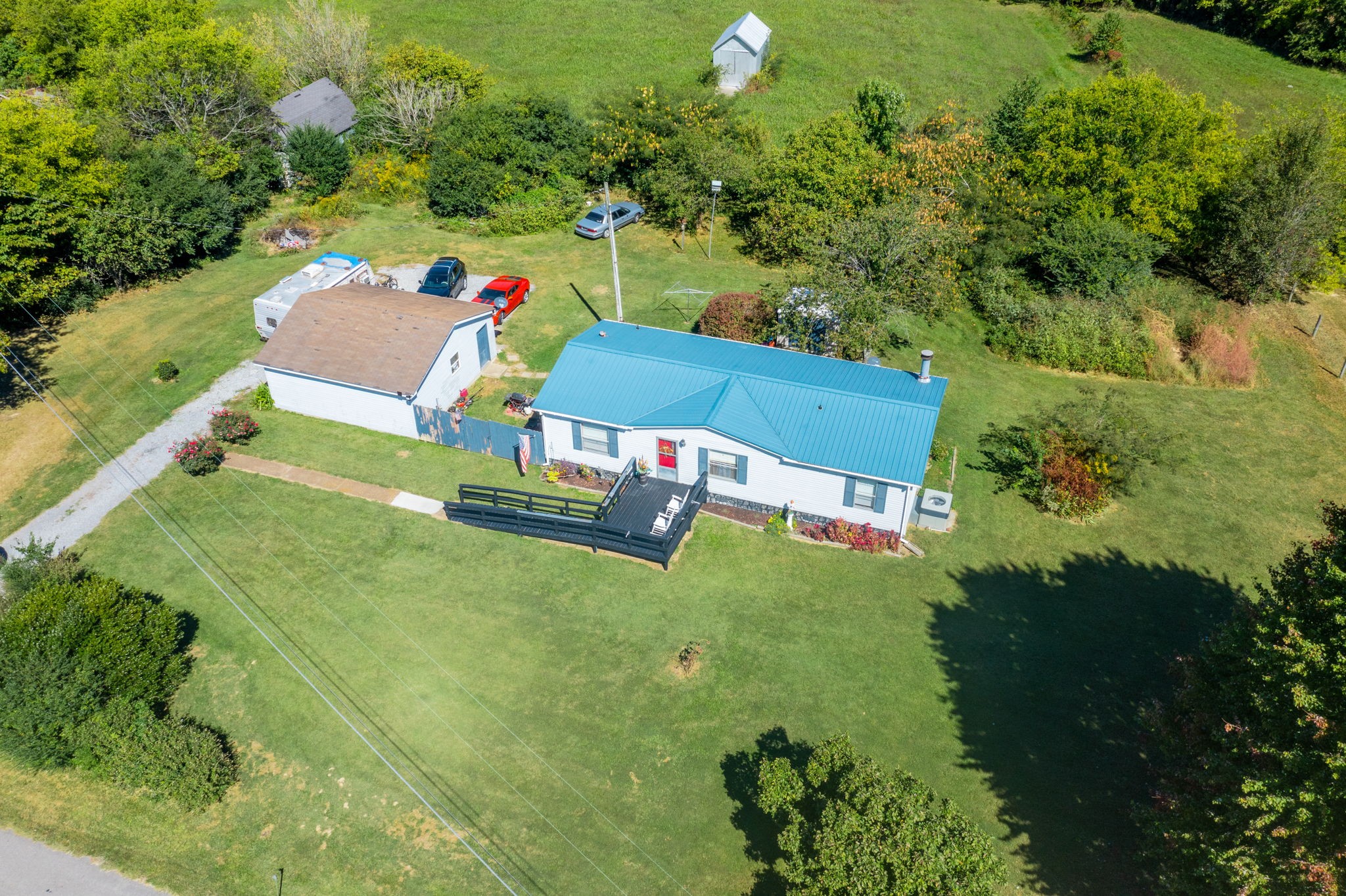 260 Ragland Road Cottontown, TN 37048 - Photo 5 of 36 an aerial view of house with yard