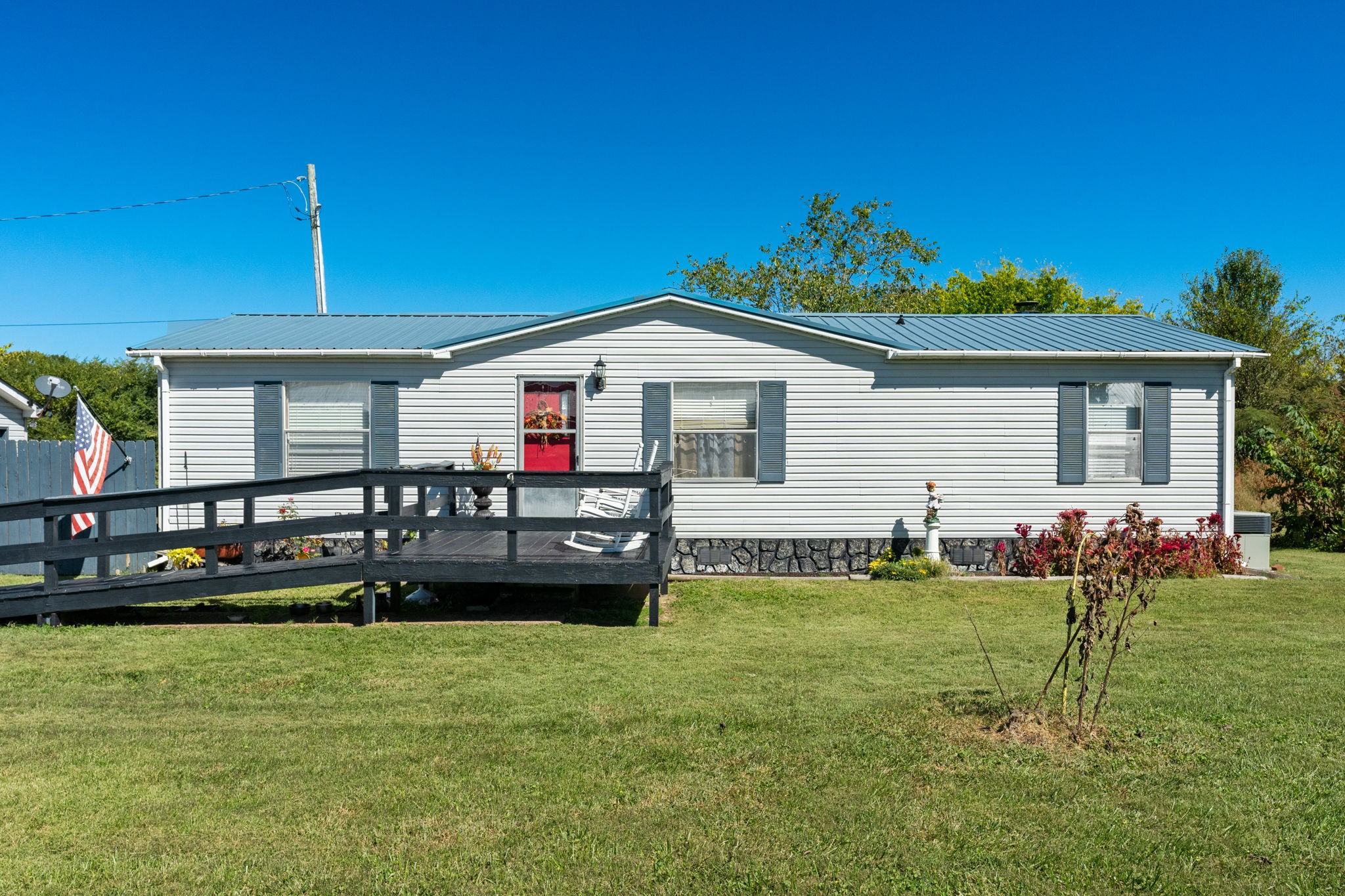 260 Ragland Road Cottontown, TN 37048 - Photo 9 of 36 a front view of a house with a yard