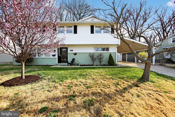 a house view with a garden space