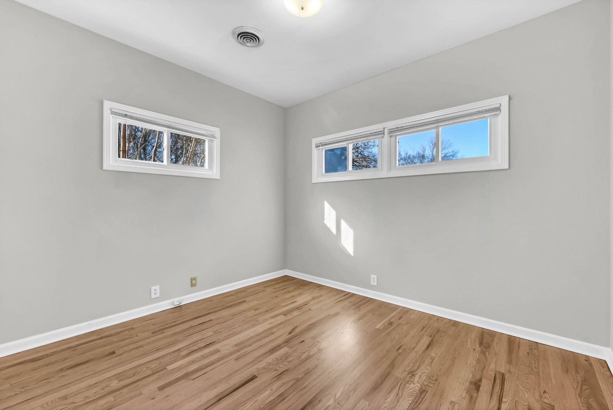 780 Rossview Road Clarksville, TN 37043 - Photo 20 of 40 a view of empty room with wooden floor
