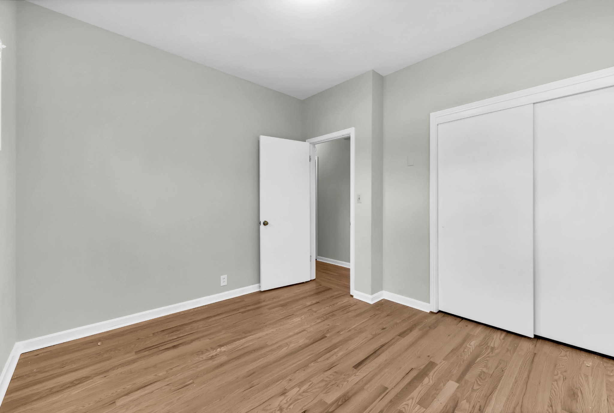 780 Rossview Road Clarksville, TN 37043 - Photo 22 of 40 a view of an empty room with wooden floor