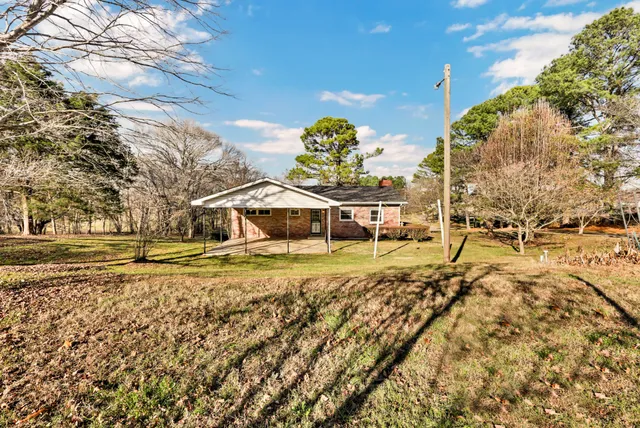 a view of a swimming pool with an outdoor space