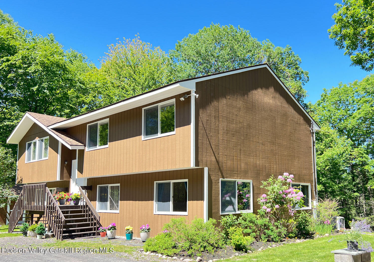 170 Macdaniel Road Woodstock, NY 12498 - Photo 5 of 33 a house with trees in the background