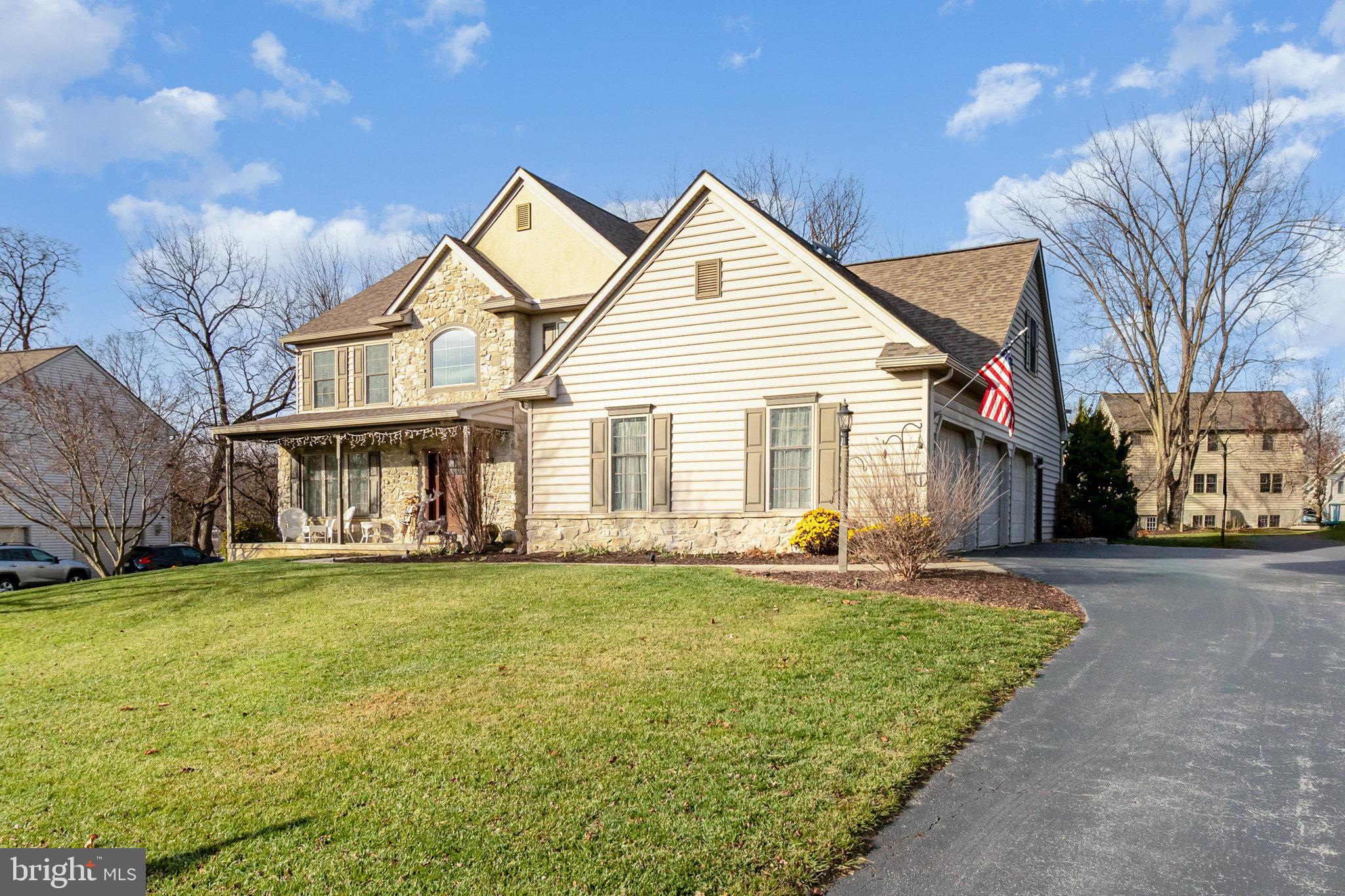 123 Glebe Lane Lancaster, PA 17602 - Photo 3 of 57 a view of a house with a yard and sitting area