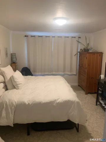 a large bed sitting in a room