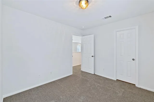 a view of a livingroom and a window