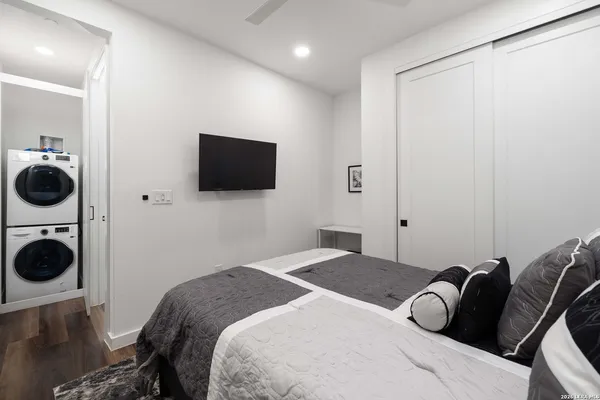 a view of a patio with a table and chairs and wooden floor