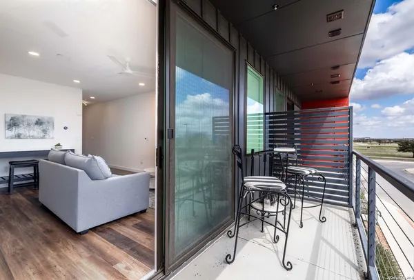 a view of play room with furniture and toys