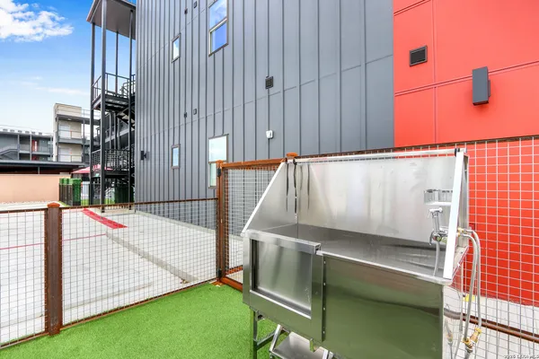 a view of outdoor space with deck and a garden