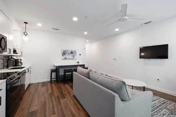 a view of a workspace with furniture