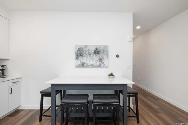 a bedroom with a bed and a chair