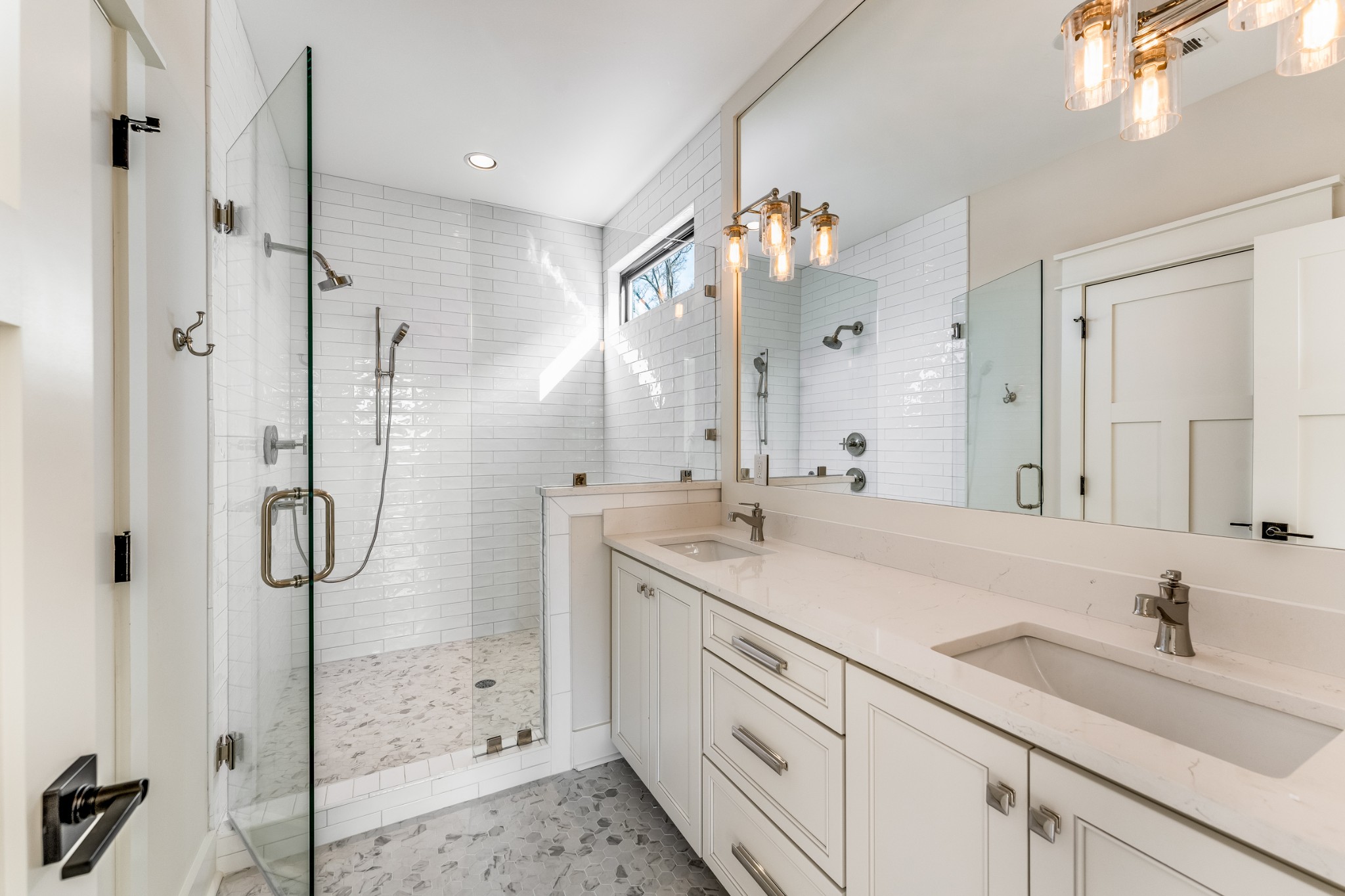 12 Shepard Street Nashville, TN 37210 - Photo 12 of 23 a bathroom with a shower sink and mirror