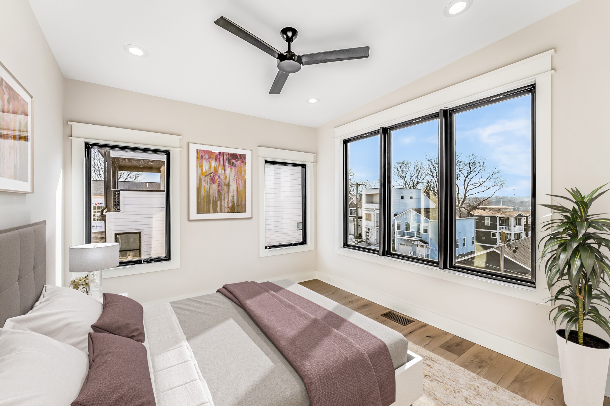 12 Shepard Street Nashville, TN 37210 - Photo 15 of 23 a bedroom with a large bed and a large window