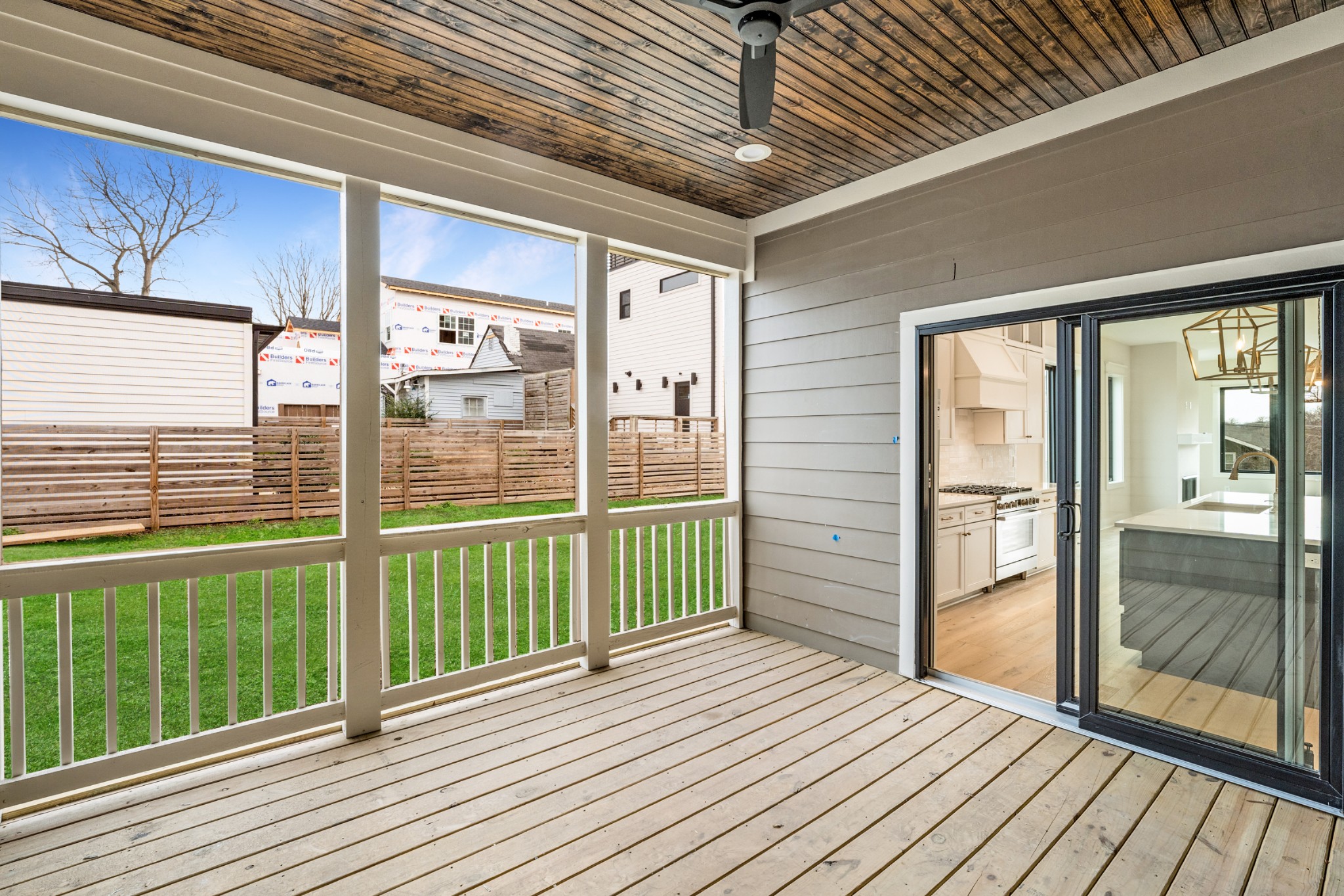 12 Shepard Street Nashville, TN 37210 - Photo 8 of 23 a view of a porch with wooden floor and floor to ceiling window