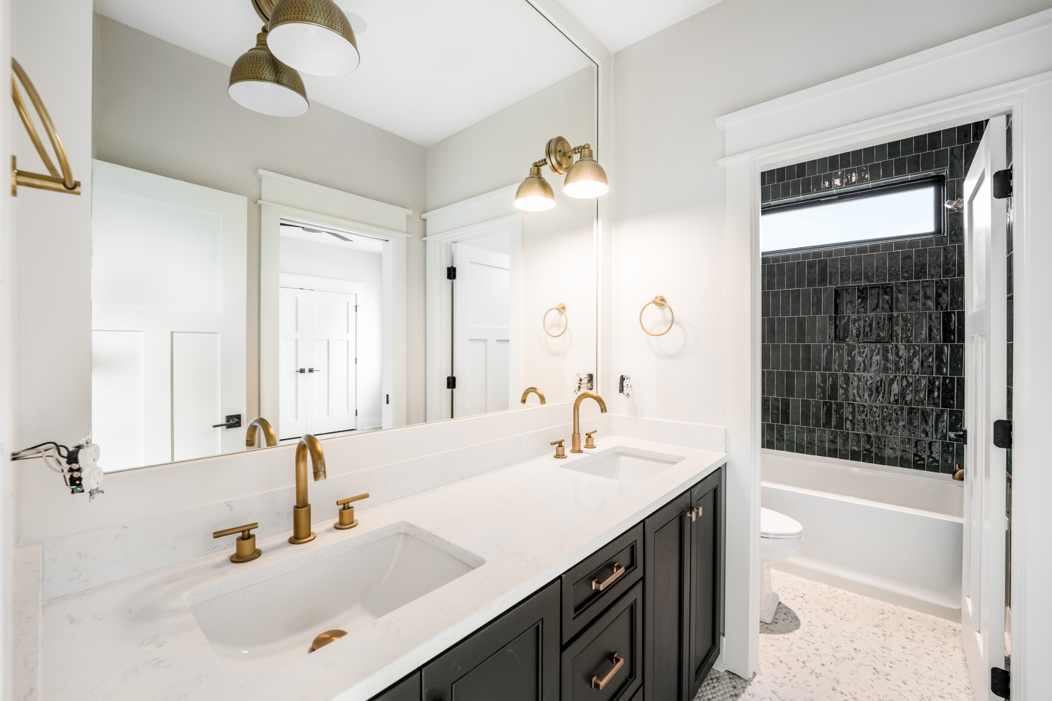 12 Shepard Street Nashville, TN 37210 - Photo 10 of 23 a bathroom with a sink vanity tub and a mirror