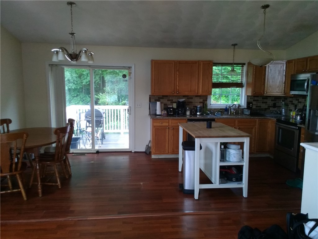 839 Fairmount Street Woonsocket, RI 02895 - Photo 11 of 43 Dining -Kitchen - deck door