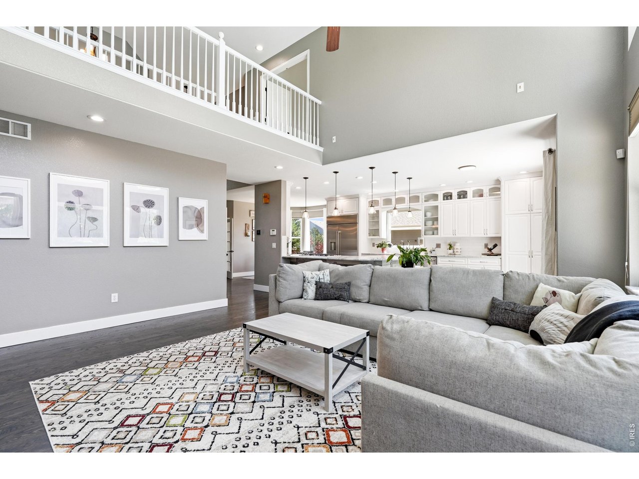 11725 Pleasant Hill Road Longmont, CO 80504 - Photo 6 of 50 The expansive living room, with soaring windows
