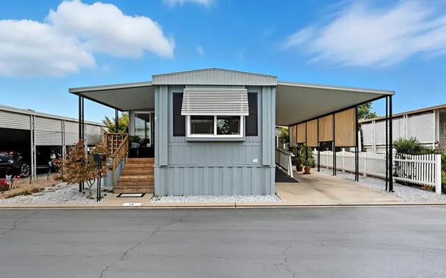 a view of a house with a patio