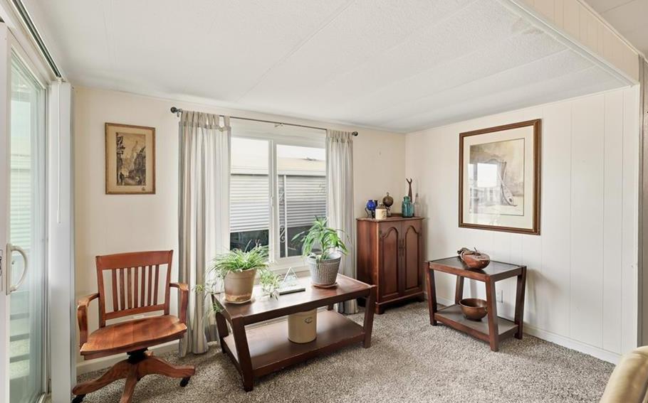 2240 Golden Oak Lane Merced, CA 95340 - Photo 12 of 44 a living room with furniture and a window