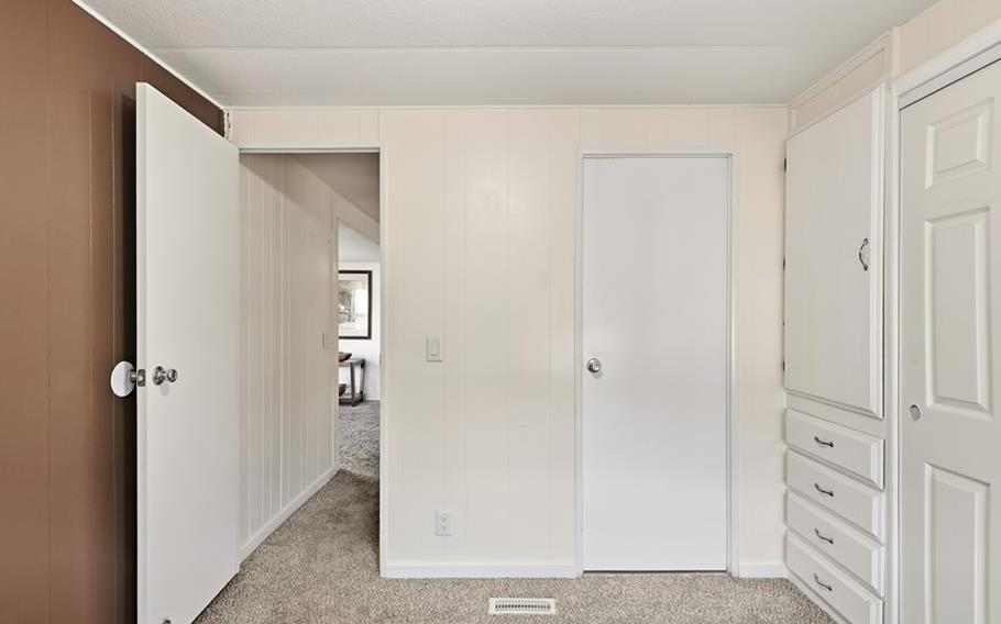 2240 Golden Oak Lane Merced, CA 95340 - Photo 23 of 44 a view of a hallway with closet and front door