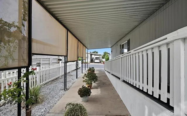 a view of a pathway with a balcony