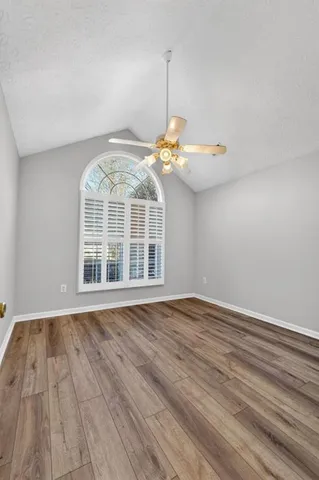 a view of a livingroom with wooden floor