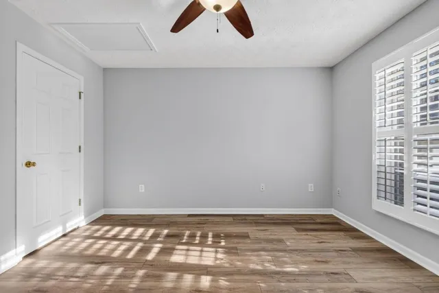 a view of an empty room and window