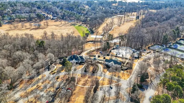 an aerial view of a houses with outdoor space