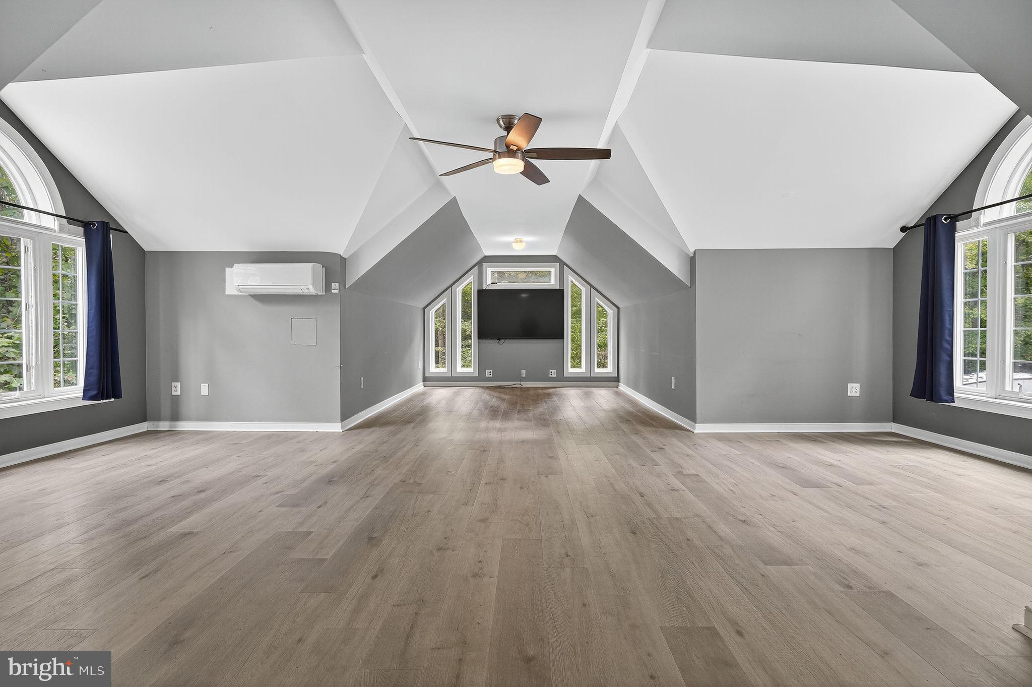 2196 Hallmark Court Gambrills, MD 21054 - Photo 11 of 14 wooden floor in an empty room with a window