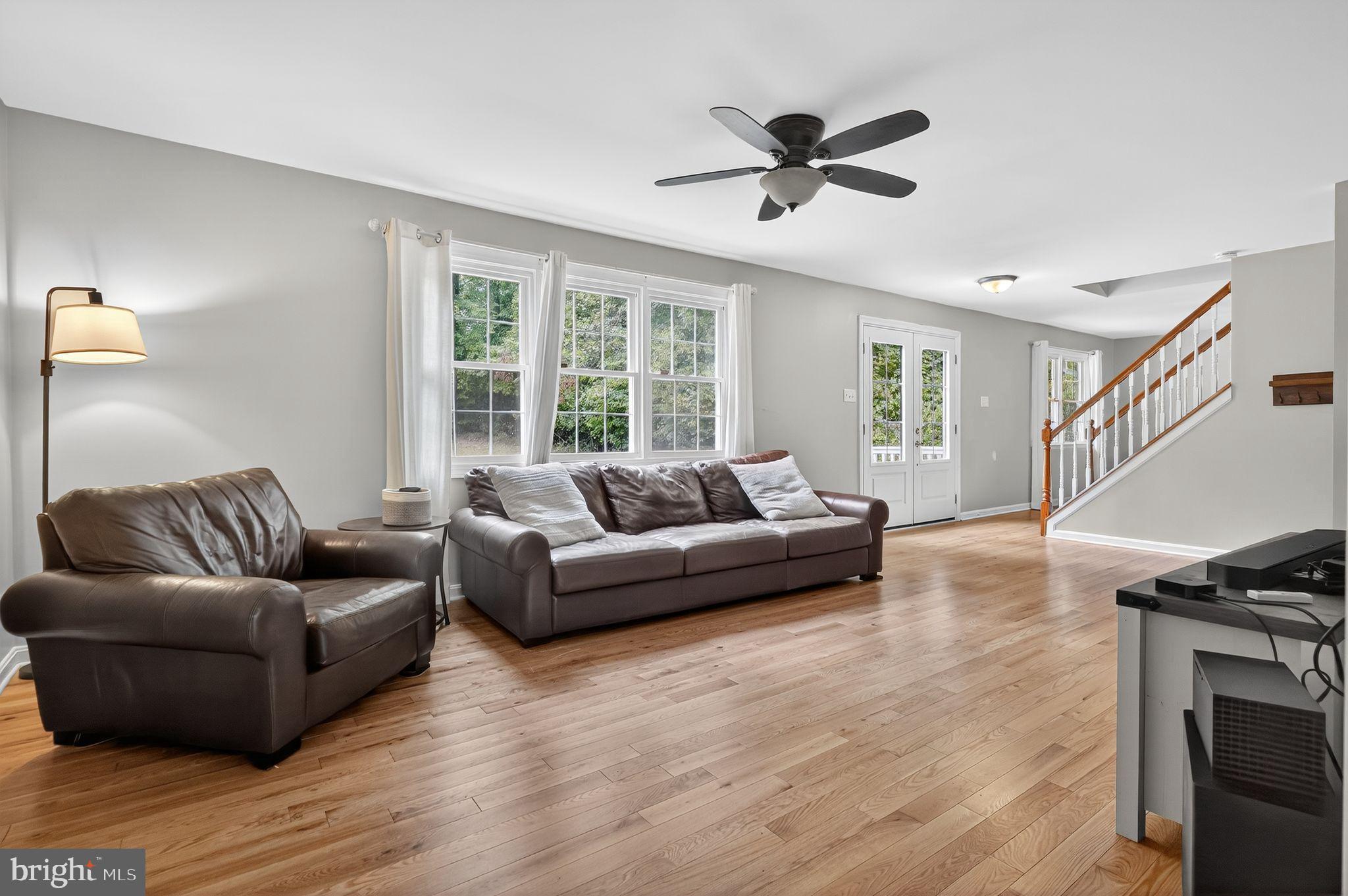 2196 Hallmark Court Gambrills, MD 21054 - Photo 2 of 14 a living room with furniture and a wooden floor