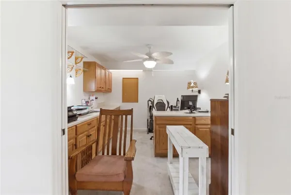 a kitchen with a sink cabinets and window